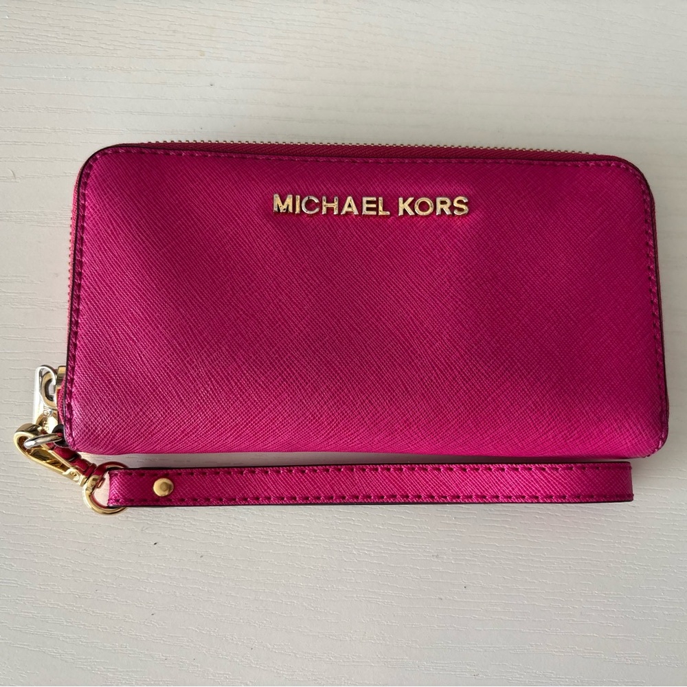 Michael Kors Fuchsia Wristlet wallet with Gold Accents